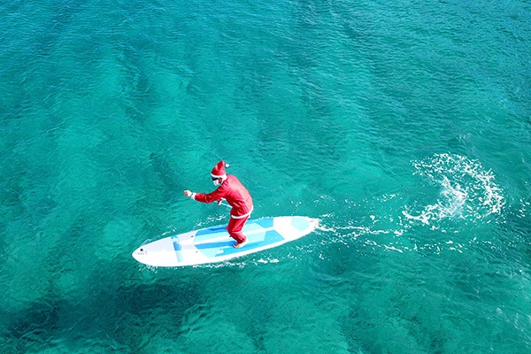 Paddle board surfing